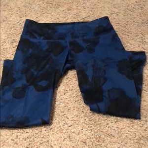 Dark blue and black lululemon crop workout pants